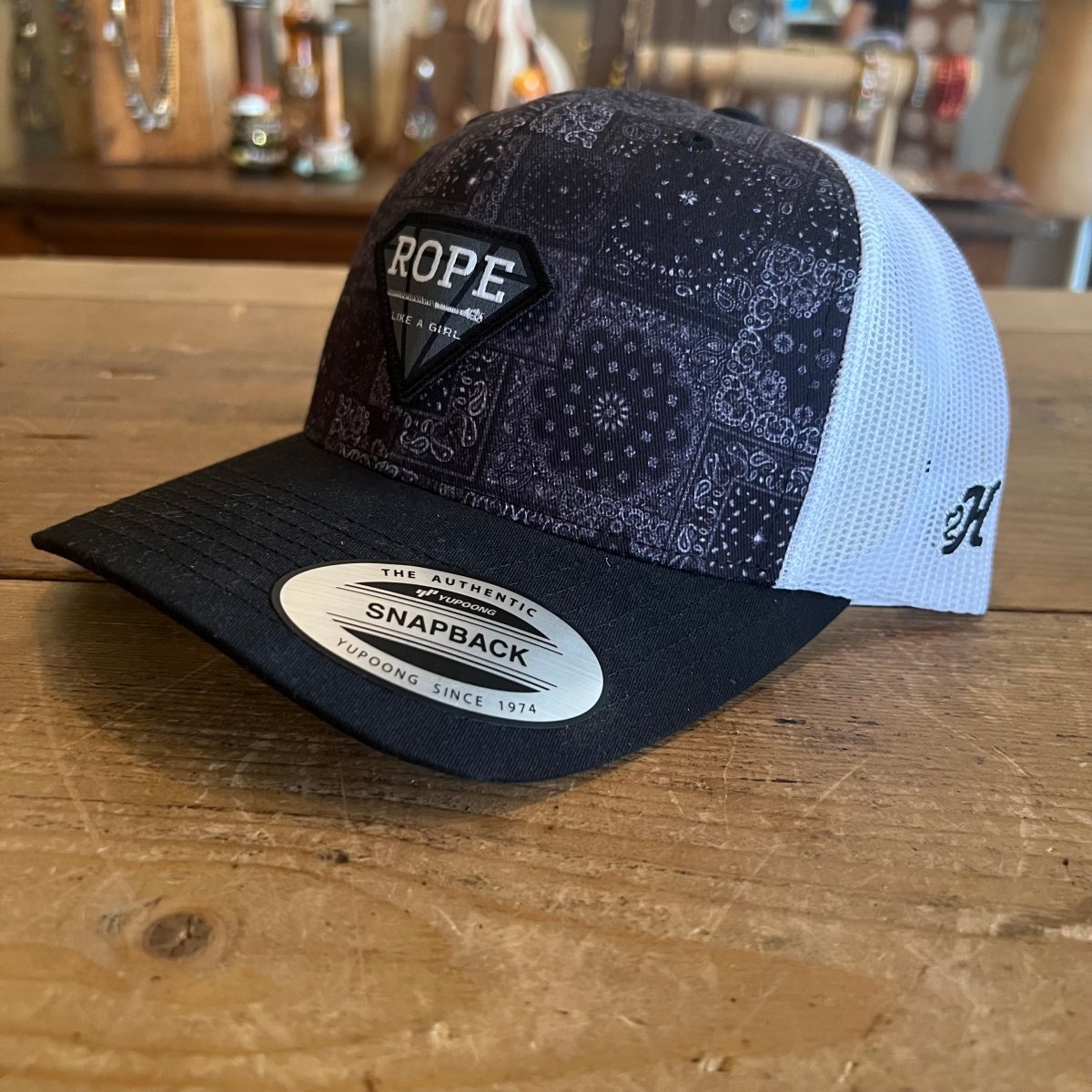 Discover Hooey Rope Like A Girl Black/White Patch & Purple Tinted Bandana Printed Hat SKU: 2349T - BKWH Quality Hooey Hats located at The Revival.