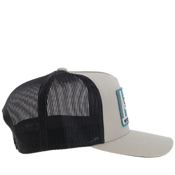 Hooey Sudan Tan Charcoal Patch Cap - Side angle of Hooey Sudan Tan Charcoal trucker hat