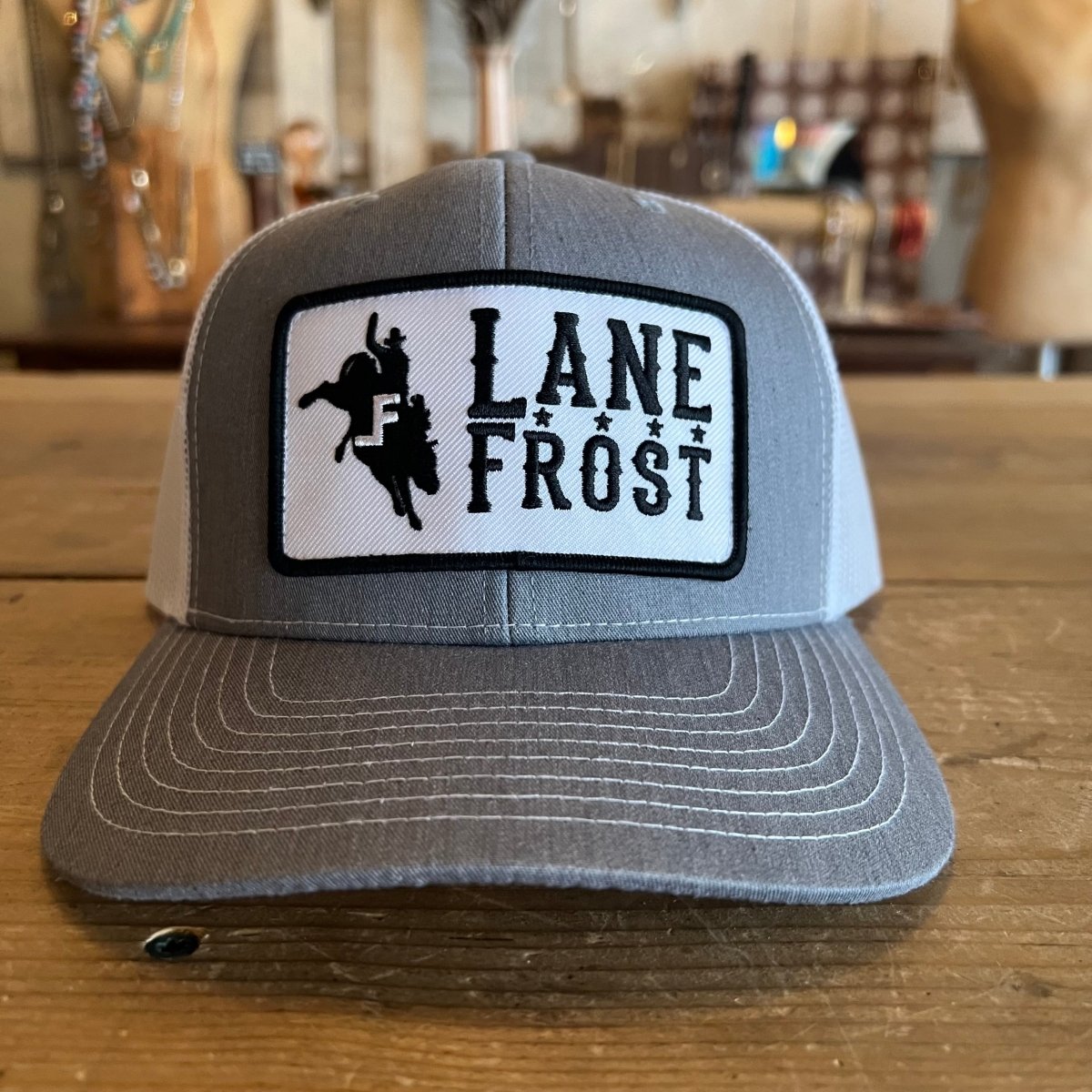 Front view of Lane Frost Bucker Cap
