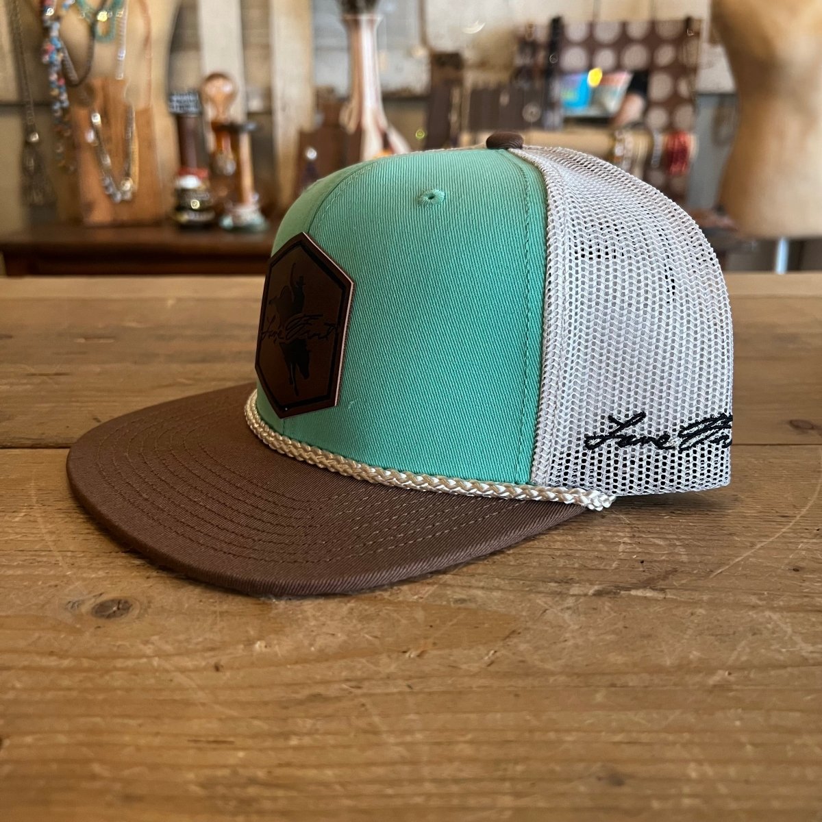 Side View of Teal Colored Outlaw Cap by Lane Frost Brand