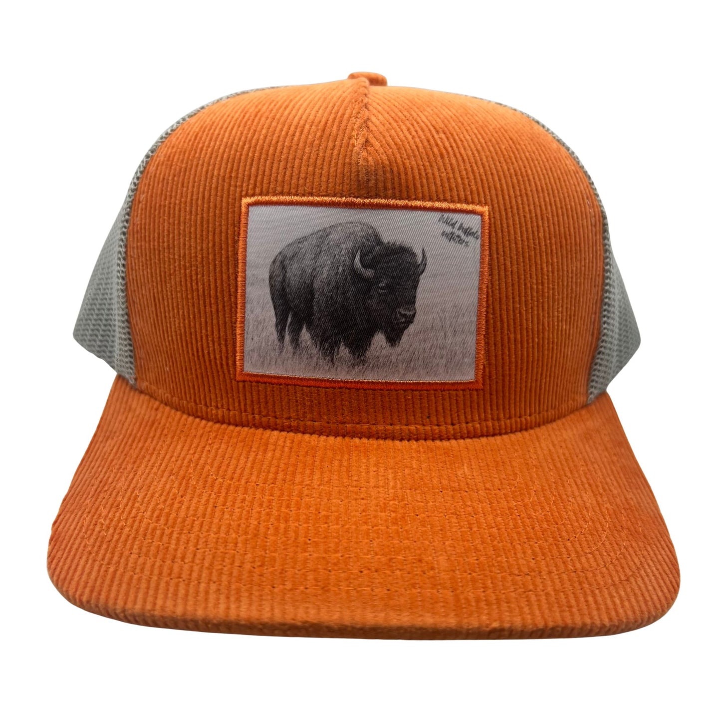 Front view of Wild Buffalo Outfitter Orange Corduroy Trucker Hat with Buffalo Patch