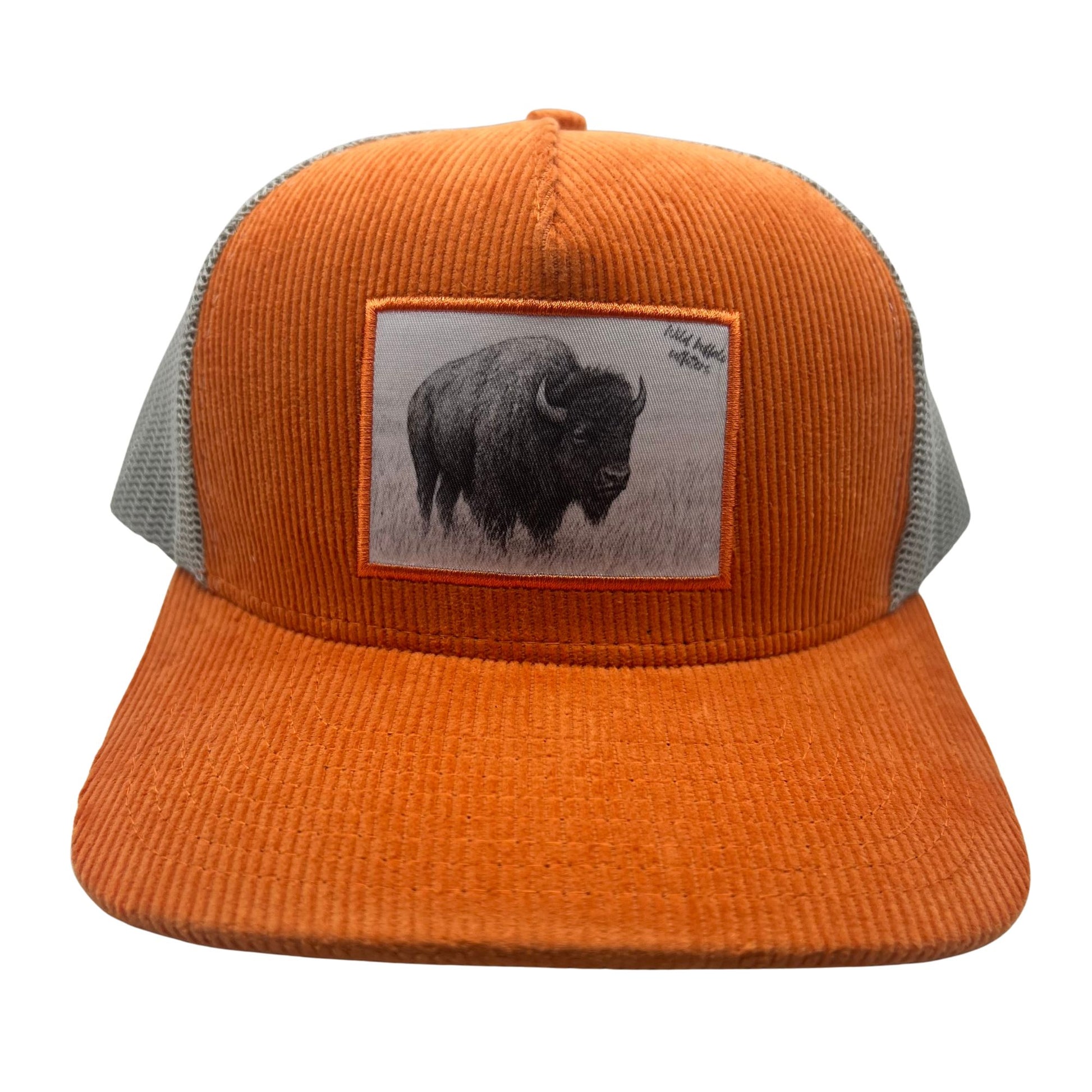 Front view of Wild Buffalo Outfitter Orange Corduroy Trucker Hat with Buffalo Patch