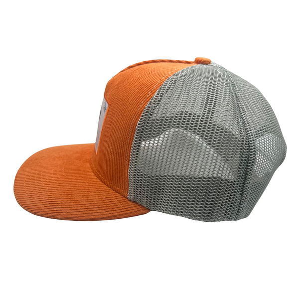 Wild Buffalo Outfitters Orange Corduroy Buffalo Trucker Hat - Left Side View of Wild Buffalo Outfitter Orange Corduroy Trucker Hat with Buffalo Patch
