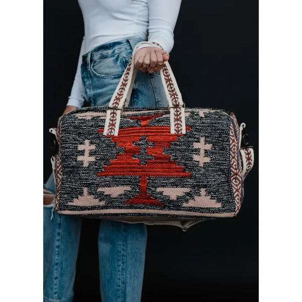 Panache Apparel Co. Faded Black, Tan & Red Aztec Duffel - Discover Panache Apparel Co. Faded Black, Tan & Red Aztec Duffel Quality Panache Apparel Co. Duffel Bag at The Revival.