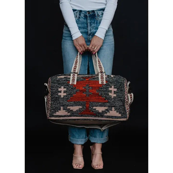 Panache Apparel Co. Faded Black, Tan & Red Aztec Duffel - Discover Panache Apparel Co. Faded Black, Tan & Red Aztec Duffel Quality Panache Apparel Co. Duffel Bag at The Revival.