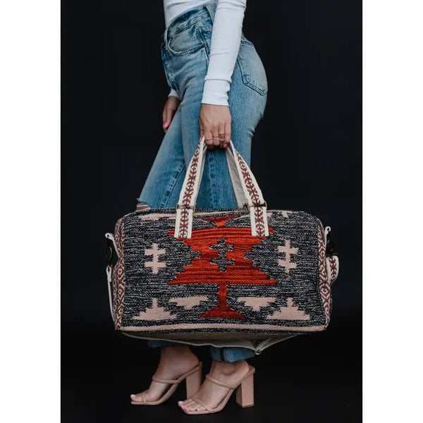 Panache Apparel Co. Faded Black, Tan & Red Aztec Duffel - Discover Panache Apparel Co. Faded Black, Tan & Red Aztec Duffel Quality Panache Apparel Co. Duffel Bag at The Revival.