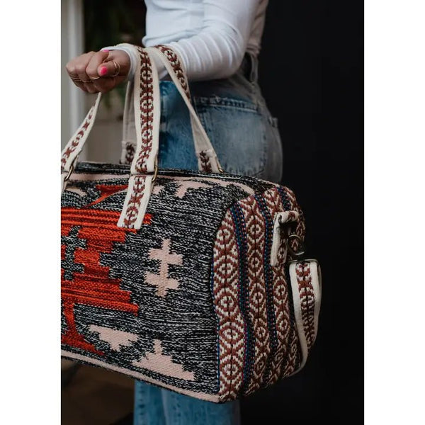 Panache Apparel Co. Faded Black, Tan & Red Aztec Duffel - Discover Panache Apparel Co. Faded Black, Tan & Red Aztec Duffel Quality Panache Apparel Co. Duffel Bag at The Revival.