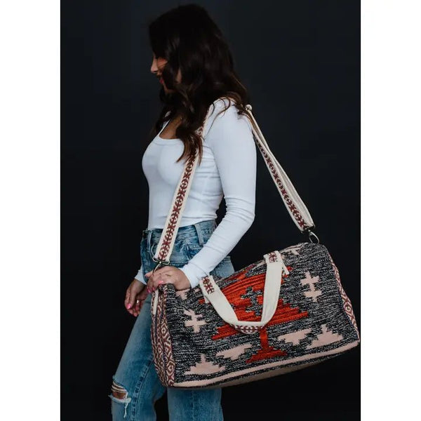 Panache Apparel Co. Faded Black, Tan & Red Aztec Duffel - Discover Panache Apparel Co. Faded Black, Tan & Red Aztec Duffel Quality Panache Apparel Co. Duffel Bag at The Revival.