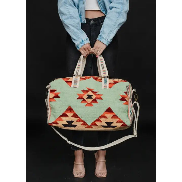 Panache Apparel Co. Mint & Multicolored Aztec Duffel - Discover Panache Apparel Co. Mint & Multicolored Aztec Duffel Quality Panache Apparel Co. Duffel Bag located at The Revival.