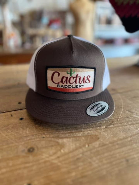 Red Dirt Hat Co. Cactus Saddlery Hat - Brown & White - Discover Red Dirt Hat Co. Cactus Saddlery Hat - Brown & White Quality Red Dirt Hat Co. Hats located at The Revival.